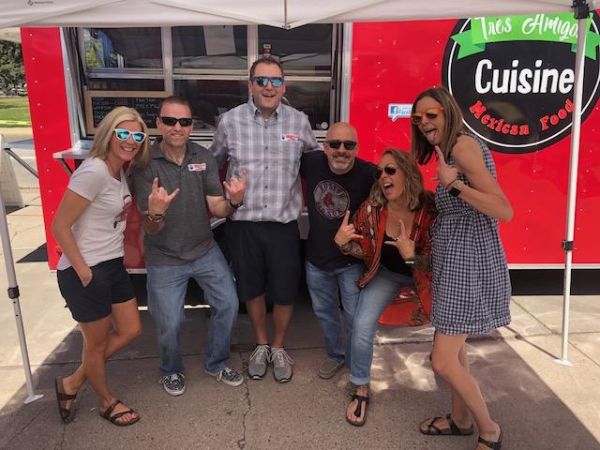 The Elite Team at REMAX Flagstaff in front of tres amigos food truck